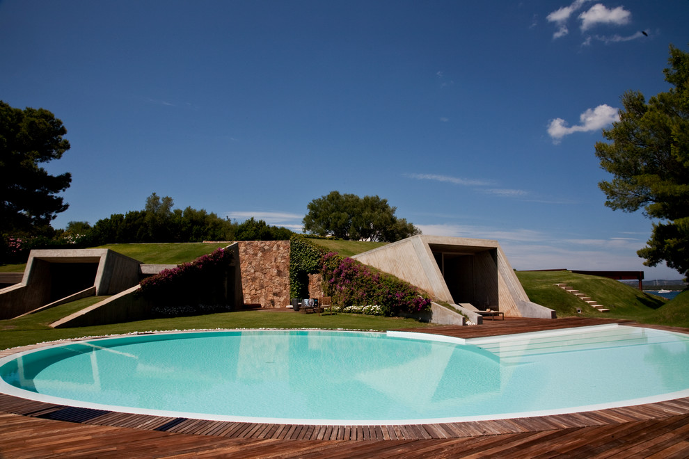This is an example of a contemporary custom-shaped pool in Other.
