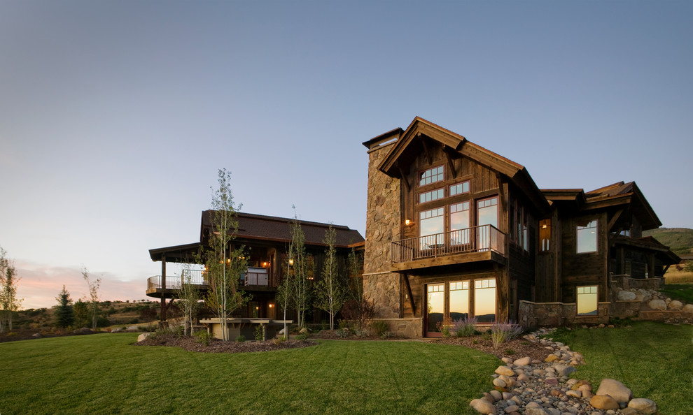 Design ideas for a traditional exterior in Denver with stone veneer.