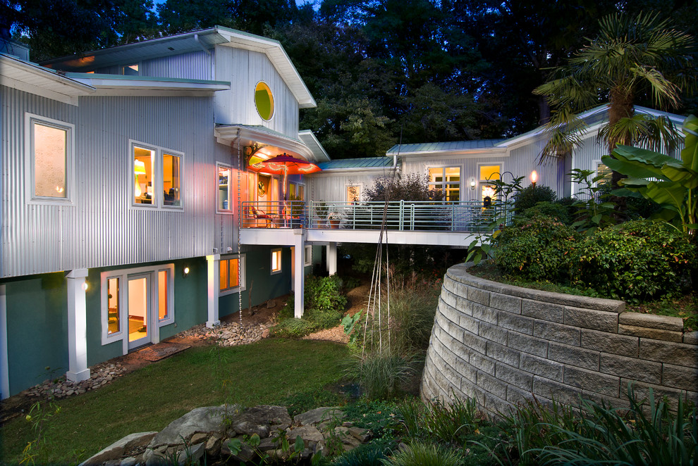 Example of a mid-sized trendy white one-story wood gable roof design in Charlotte