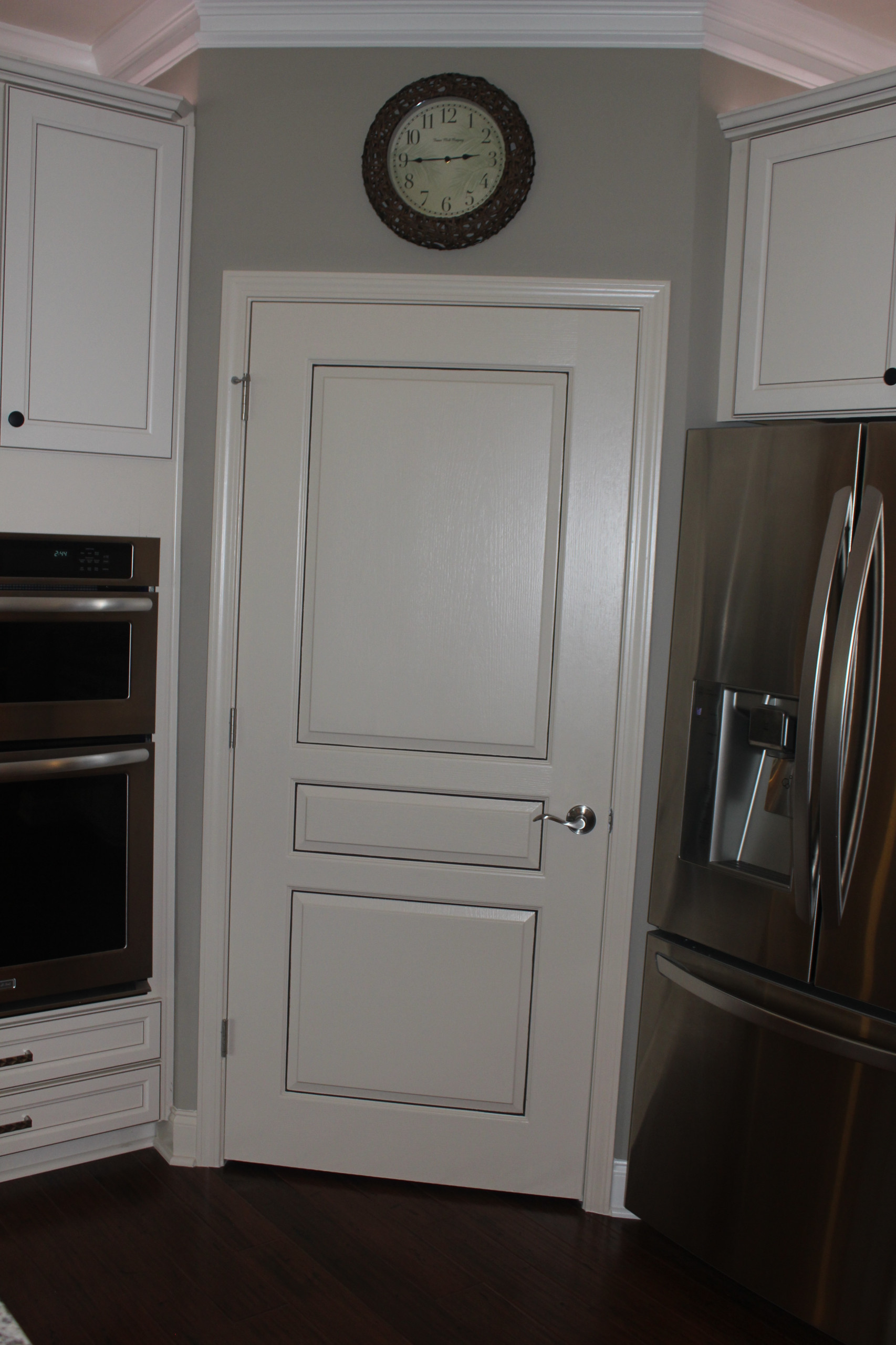 All standard kitchen cabinets were given a bronze glaze