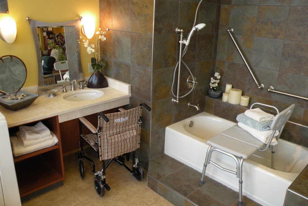 Small asian 3/4 bathroom in Phoenix with open cabinets, medium wood cabinets, a drop-in tub, an open shower, a one-piece toilet, beige tile, ceramic tile, yellow walls, travertine floors, an undermount sink, tile benchtops and beige floor.