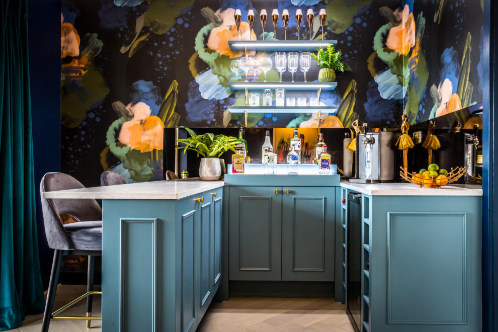 This is an example of a small eclectic home bar in London.