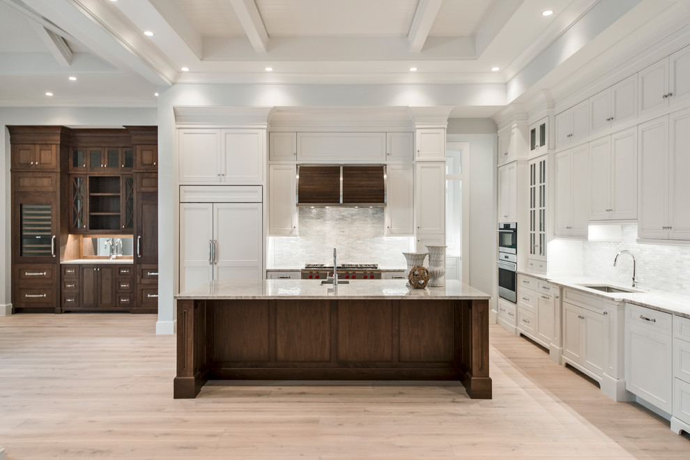 Inspiration for a transitional light wood floor open concept kitchen remodel with stainless steel appliances and an island