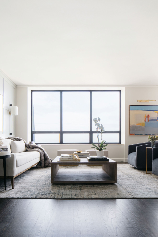 Idee per un soggiorno contemporaneo di medie dimensioni e aperto con pareti blu, parquet scuro, pavimento marrone e boiserie