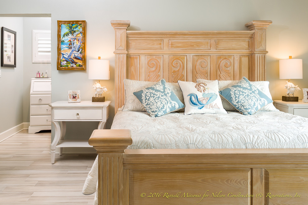 Design ideas for a large beach style bedroom in Tampa.