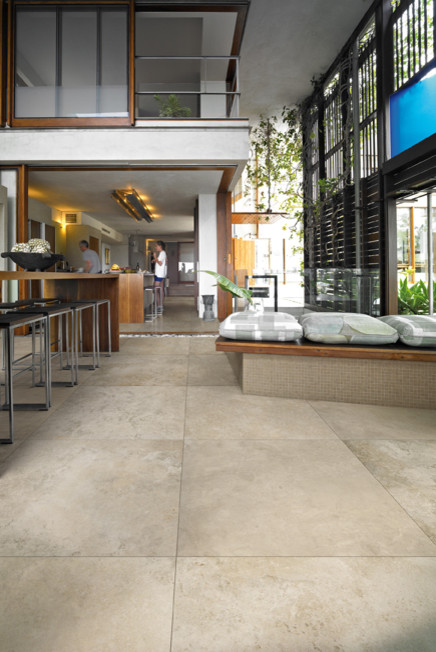 Photo of a contemporary open concept living room in Sydney with porcelain floors.