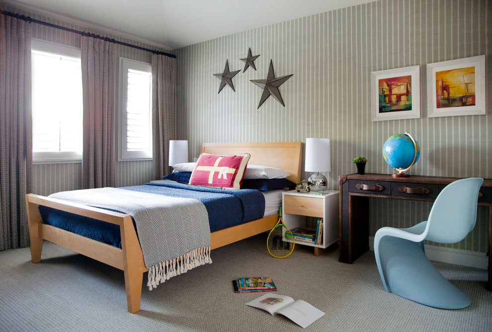 Mid-sized transitional gender-neutral kids' bedroom in San Francisco with carpet, beige walls and beige floor for kids 4-10 years old.