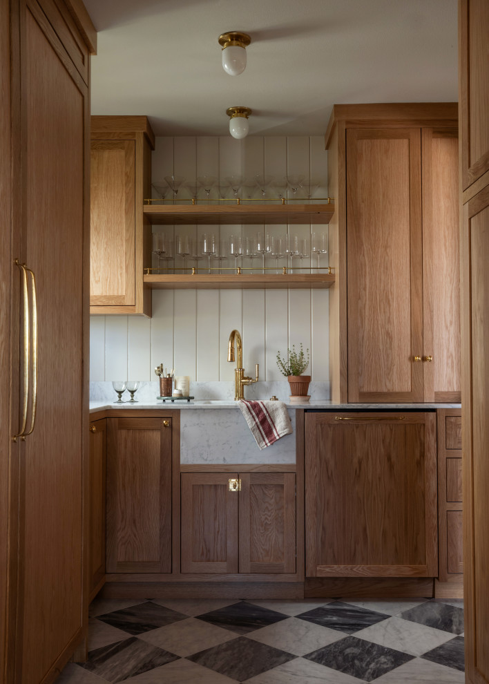 Example of a small classic l-shaped marble floor enclosed kitchen design in Seattle with a farmhouse sink, shaker cabinets, beige cabinets, marble countertops, marble backsplash, paneled appliances, no island and white countertops