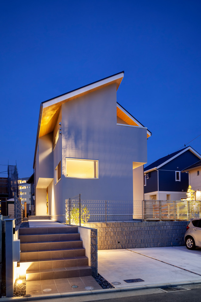 他の地域にあるおしゃれな家の外観の写真