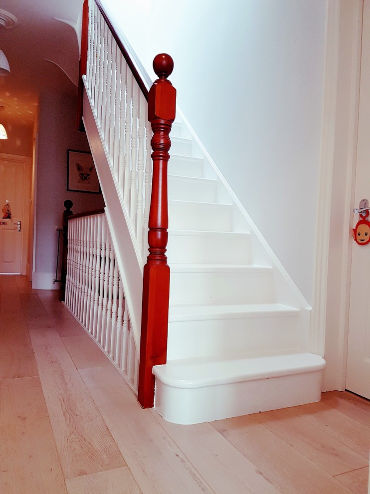 This is an example of a large traditional staircase in London.