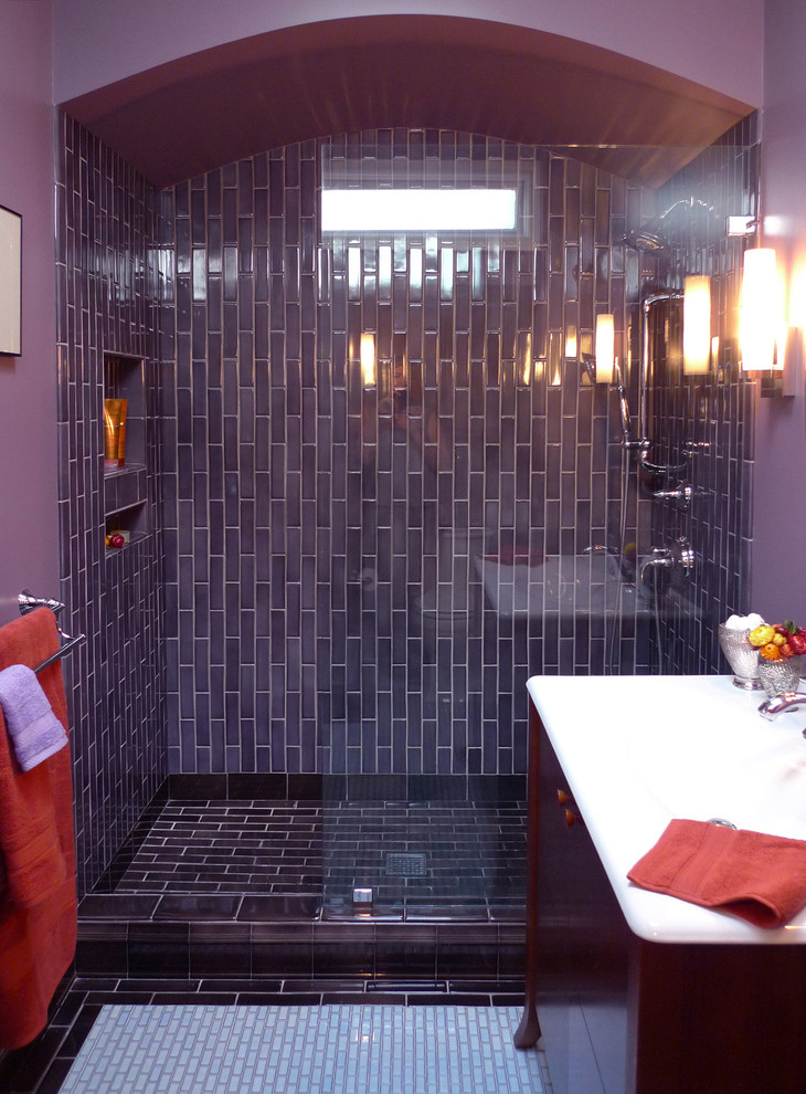 This is an example of a small transitional master bathroom in San Francisco with an integrated sink, flat-panel cabinets, medium wood cabinets, solid surface benchtops, an open shower, multi-coloured tile, ceramic tile, purple walls and ceramic floors.
