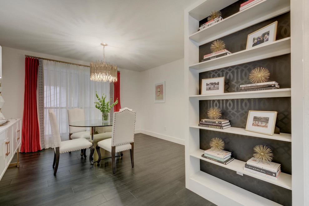 Inspiration for a transitional dining room remodel in Austin with white walls