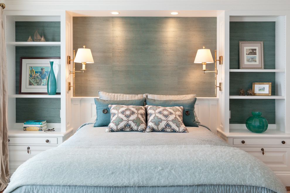 This is an example of a traditional bedroom in Boston with blue walls.