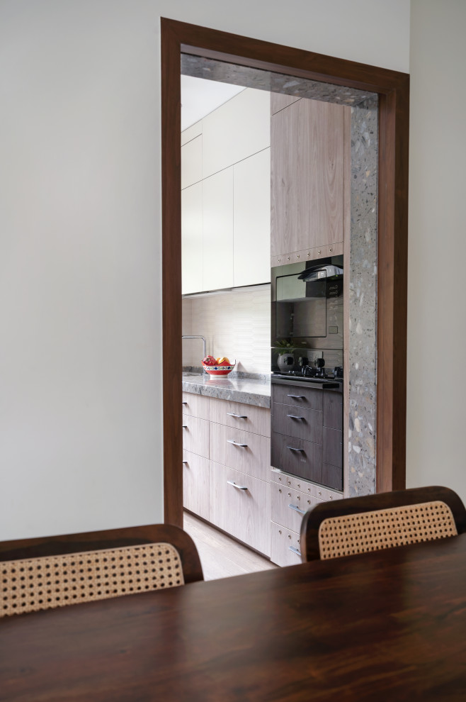 This is an example of a contemporary kitchen in Mumbai.