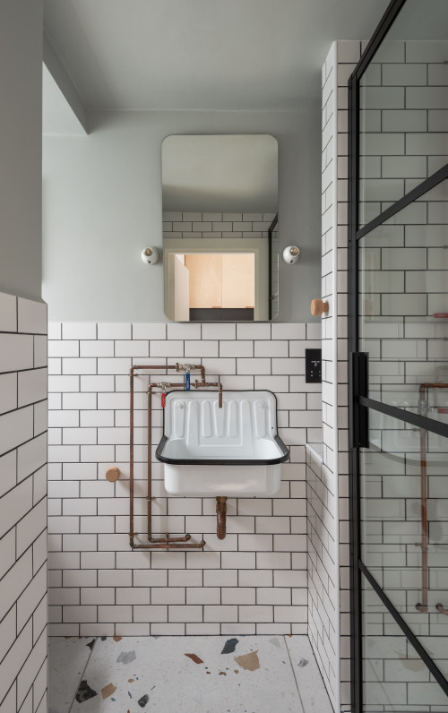 Contemporary Elegance: Small Industrial Bathroom Ideas with White Subway Tiles