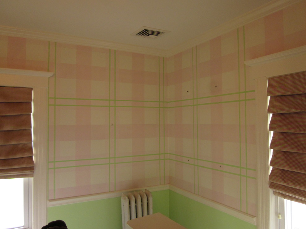 Kids' room - small traditional girl painted wood floor kids' room idea in Other with pink walls