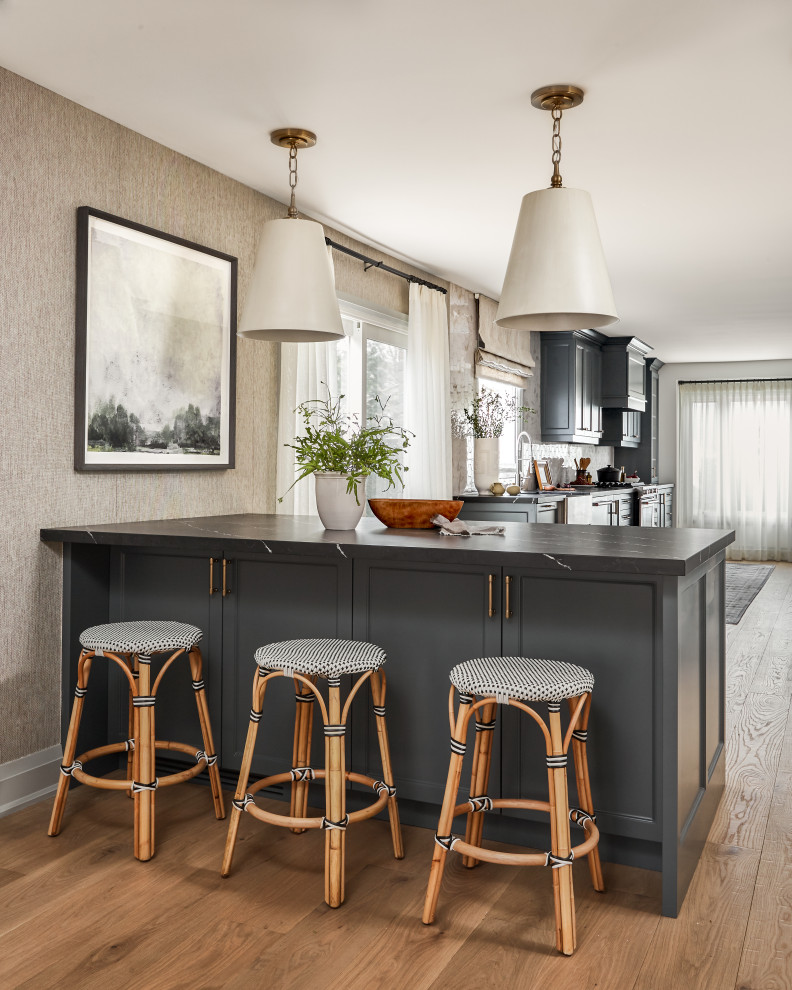 Example of a transitional home design design in Toronto