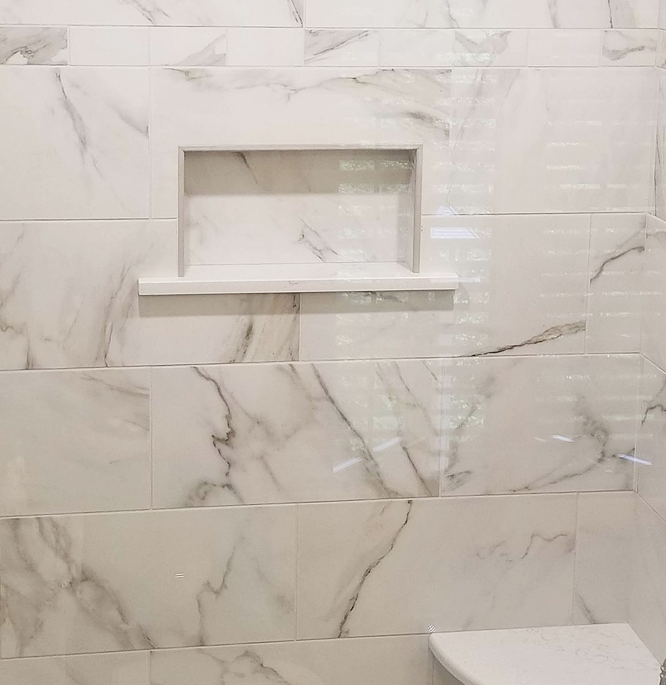 Photo of a mid-sized transitional 3/4 bathroom in Other with furniture-like cabinets, grey cabinets, a corner shower, a two-piece toilet, multi-coloured tile, porcelain tile, grey walls, porcelain floors, an undermount sink, engineered quartz benchtops, white floor, a hinged shower door and white benchtops.