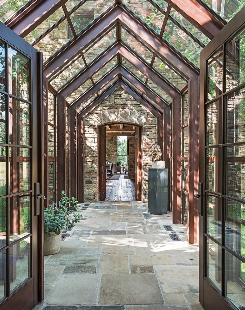Hallway - rustic beige floor hallway idea