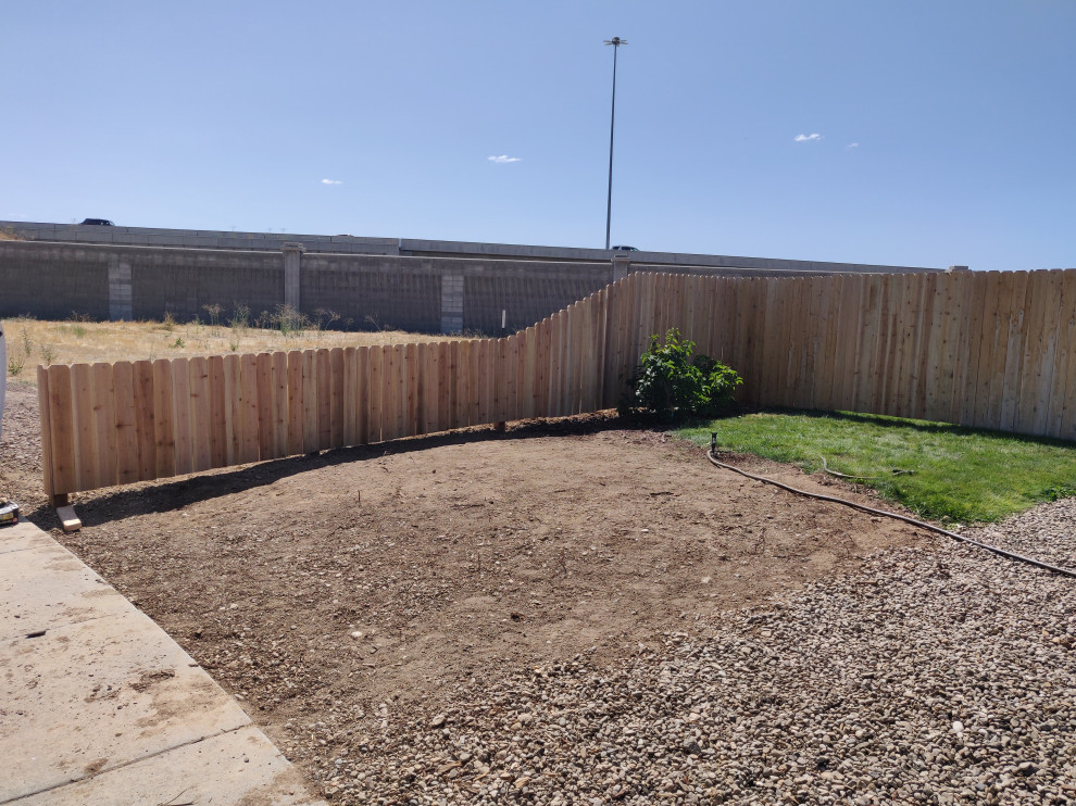 This is an example of a traditional garden in Boise with with privacy feature and a wood fence.