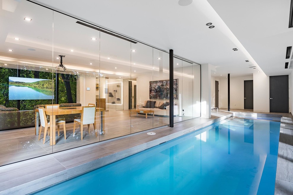 Design ideas for a contemporary pool in Toronto.