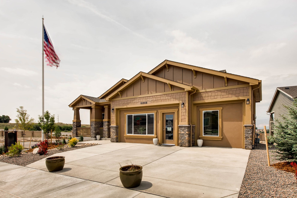 Example of a large mountain style home design design in Denver