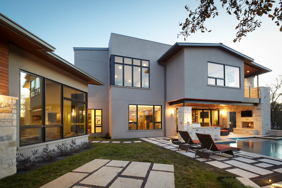 Photo of a contemporary exterior in Austin with stone veneer.
