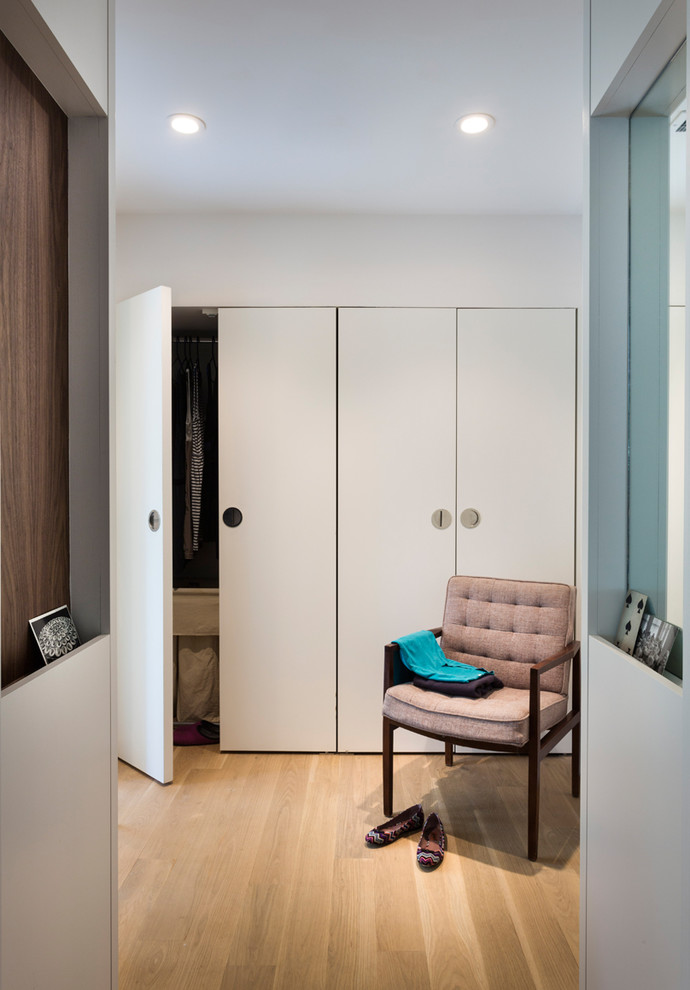 This is an example of a midcentury storage and wardrobe in Austin.