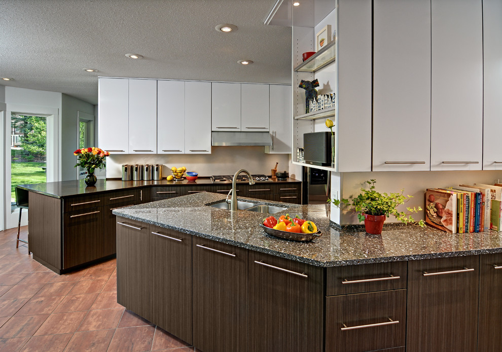 This is an example of a mid-sized contemporary galley eat-in kitchen in Minneapolis with an undermount sink, flat-panel cabinets, white cabinets, quartz benchtops, metallic splashback, stainless steel appliances, ceramic floors and a peninsula.