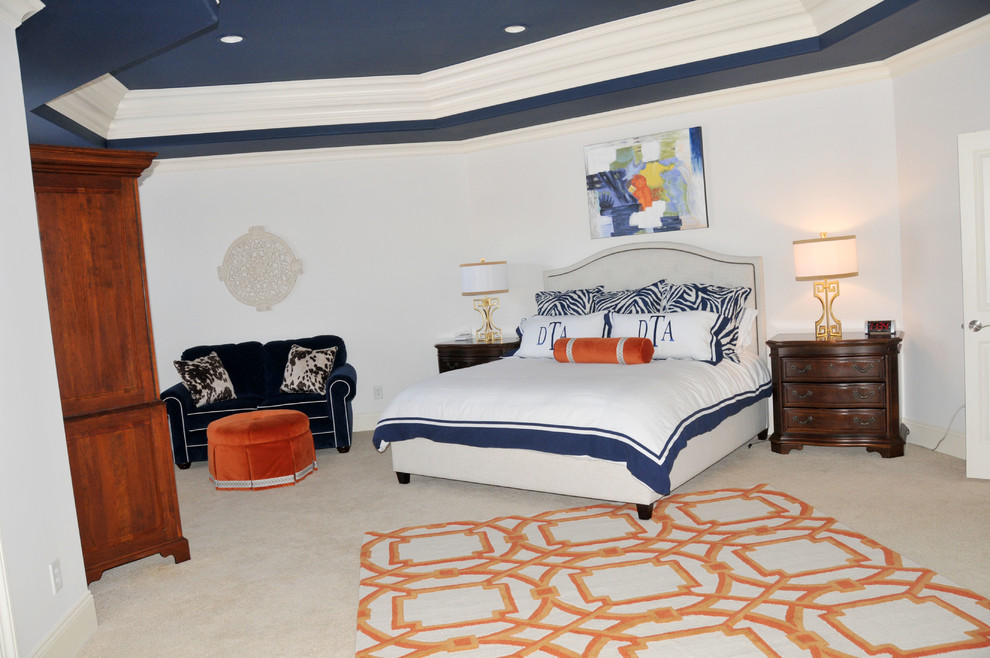 Photo of a large traditional master bedroom in Raleigh.