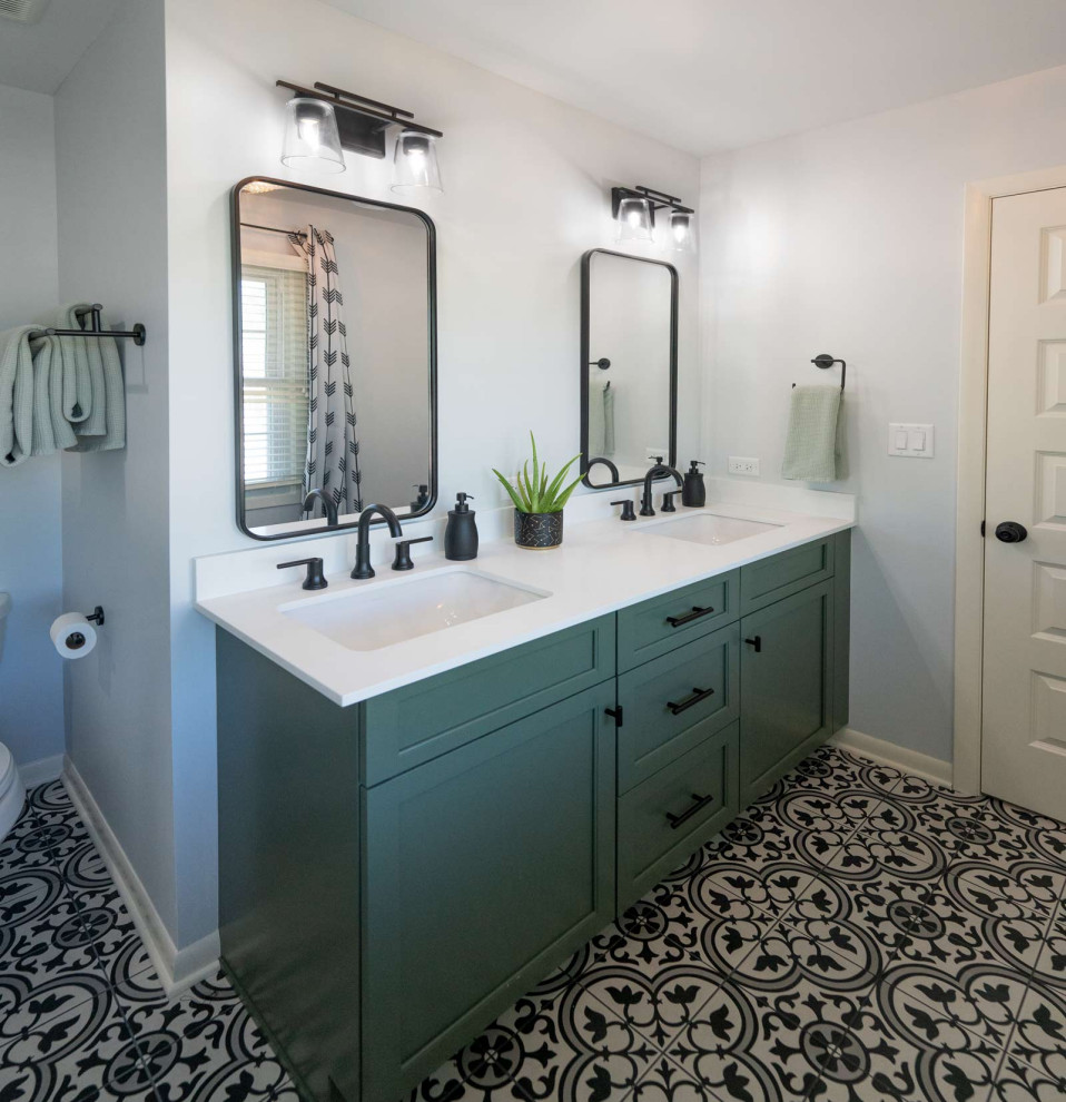 Small classic ensuite bathroom in Chicago with beaded cabinets, green cabinets, an alcove bath, a shower/bath combination, a two-piece toilet, white walls, ceramic flooring, a submerged sink, engineered stone worktops, white floors, a sliding door, white worktops, double sinks and a freestanding vanity unit.