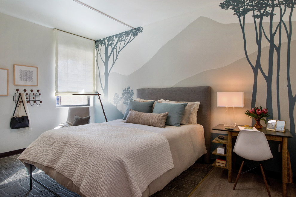 This is an example of a small modern guest bedroom in San Francisco with beige walls and vinyl floors.