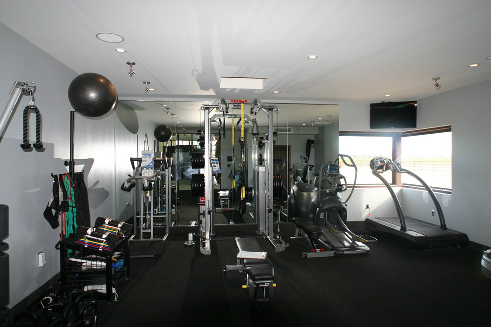 Photo of an eclectic home gym in Phoenix.