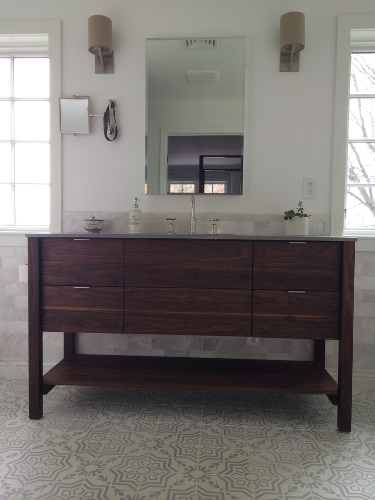 This is an example of a large modern master bathroom in Baltimore with beaded inset cabinets, dark wood cabinets and concrete benchtops.