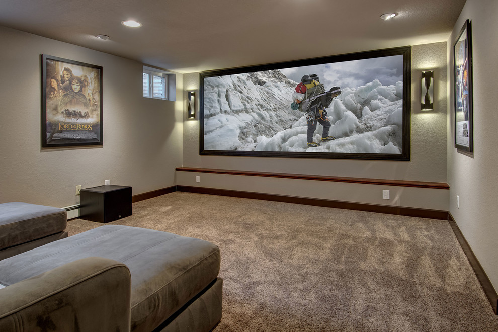 Inspiration for a large transitional home theatre in Denver with beige walls, carpet and brown floor.