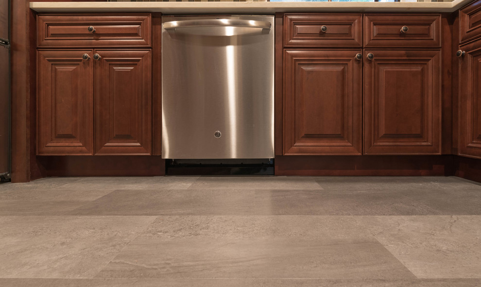 Inspiration for a mid-sized transitional u-shaped ceramic tile and gray floor enclosed kitchen remodel in Seattle with an undermount sink, beaded inset cabinets, dark wood cabinets, quartz countertops, multicolored backsplash, ceramic backsplash, stainless steel appliances and no island