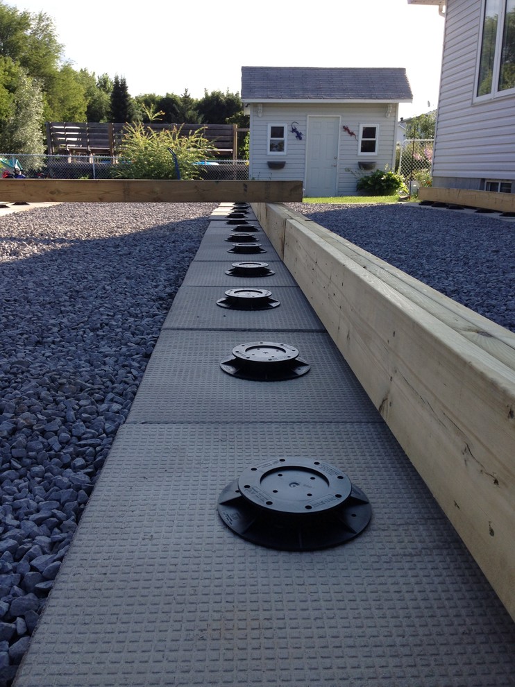 Huge transitional backyard deck photo