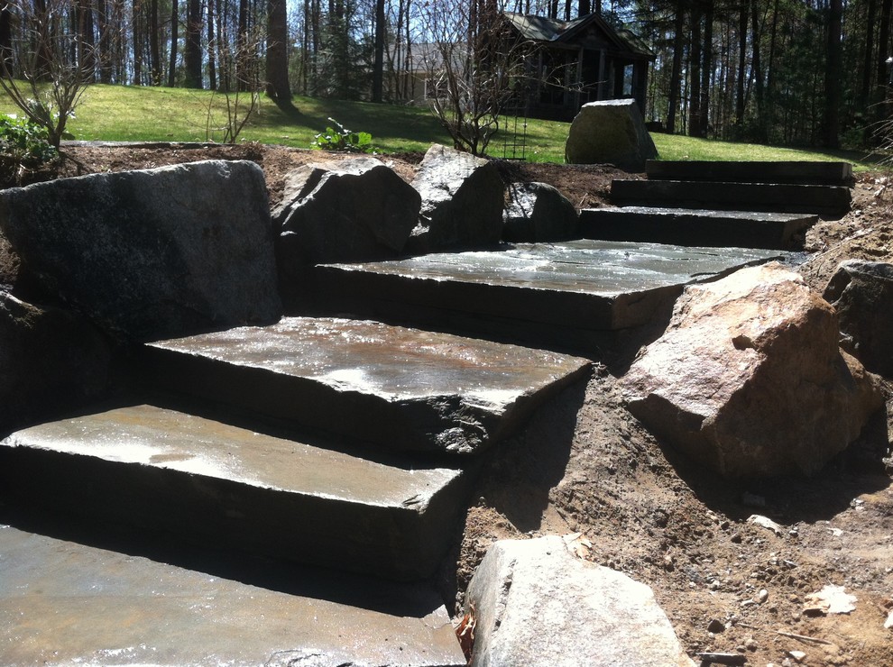 Design ideas for a rustic backyard landscaping in Manchester.