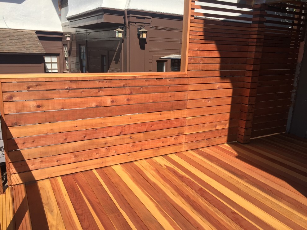 Mid-sized trendy rooftop deck photo