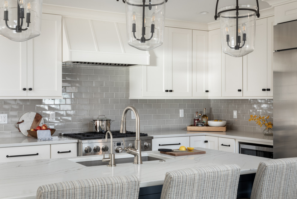 Kitchen - transitional kitchen idea with shaker cabinets, white cabinets and an island