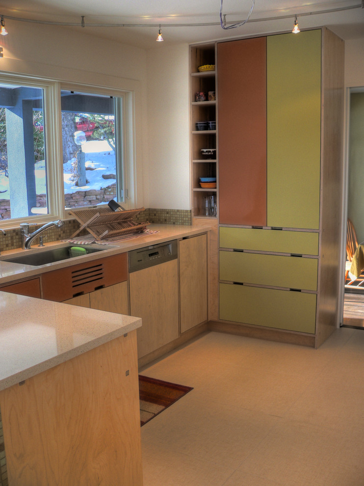 Design ideas for a midcentury kitchen in Denver with an undermount sink, flat-panel cabinets, green cabinets, quartz benchtops, green splashback and mosaic tile splashback.