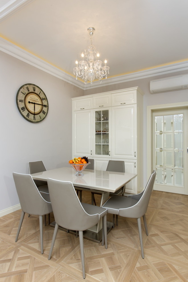 Mid-sized transitional dining room in Moscow with beige walls.