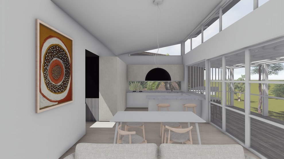 Photo of a mid-sized beach style u-shaped open plan kitchen in Sydney with an undermount sink, light wood cabinets, solid surface benchtops, glass sheet splashback, stainless steel appliances, light hardwood floors, with island and white benchtop.