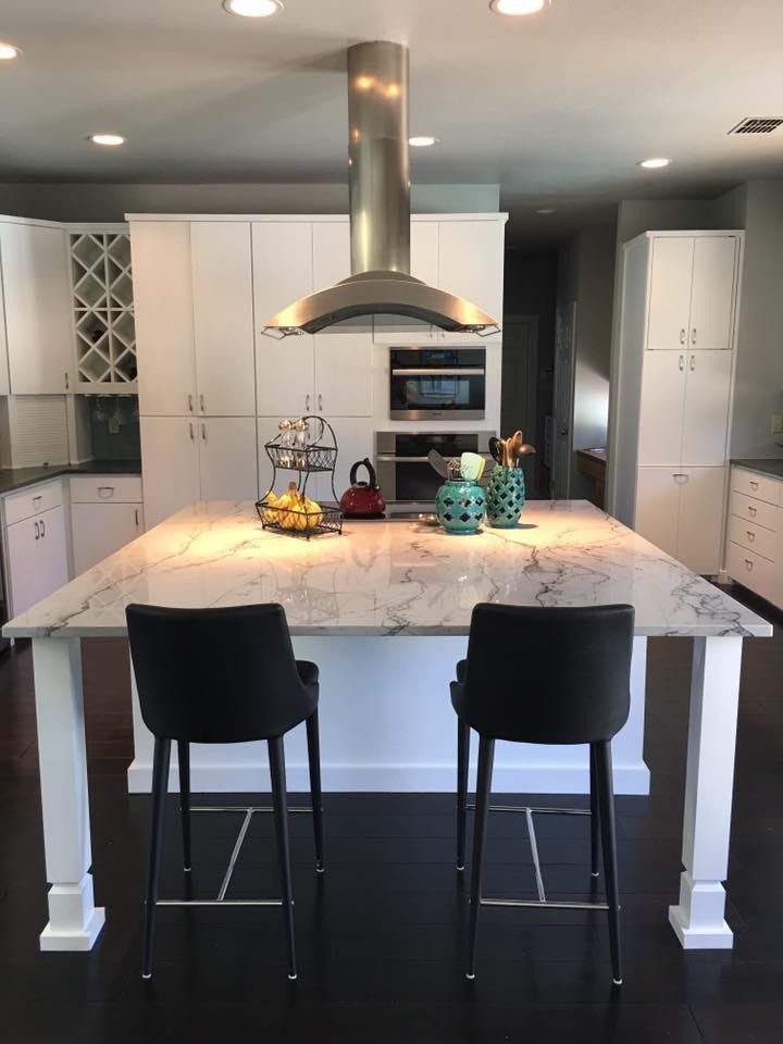 Kitchen - large transitional u-shaped dark wood floor and brown floor kitchen idea in Austin with an undermount sink, flat-panel cabinets, white cabinets, quartzite countertops, blue backsplash, subway tile backsplash, stainless steel appliances and an island