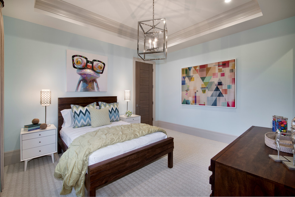 Inspiration for a large contemporary guest bedroom in Tampa with blue walls and carpet.