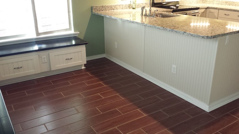 Example of a transitional kitchen design in Richmond