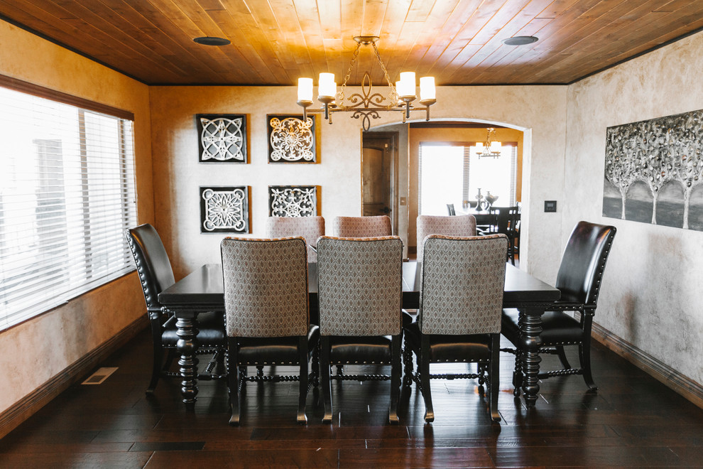 Dining room - transitional dark wood floor dining room idea with beige walls