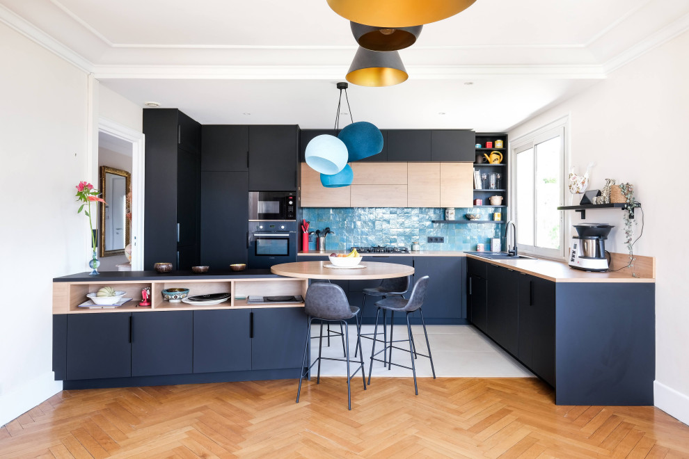 Photo of a contemporary open plan kitchen in Lyon.