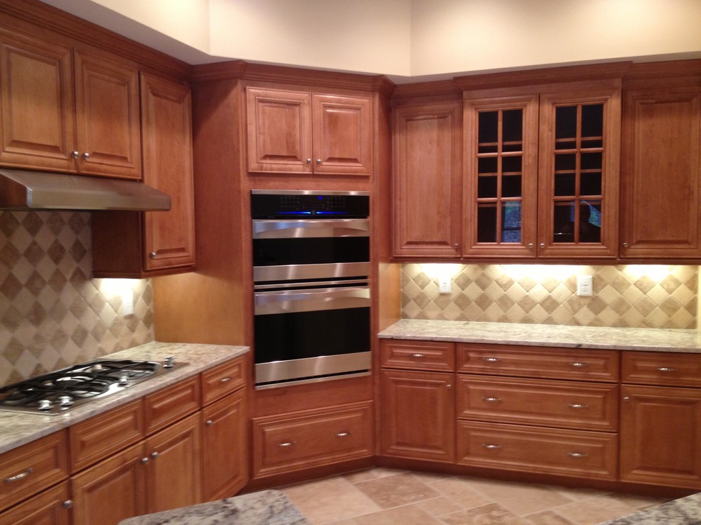 Inspiration for a large timeless travertine floor kitchen remodel in Atlanta