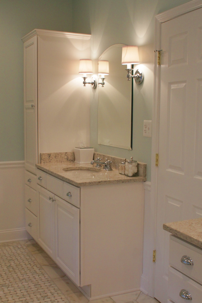 Photo of a mid-sized traditional master bathroom in Baltimore with engineered quartz benchtops, a claw-foot tub, a corner shower, ceramic tile, blue walls and marble floors.